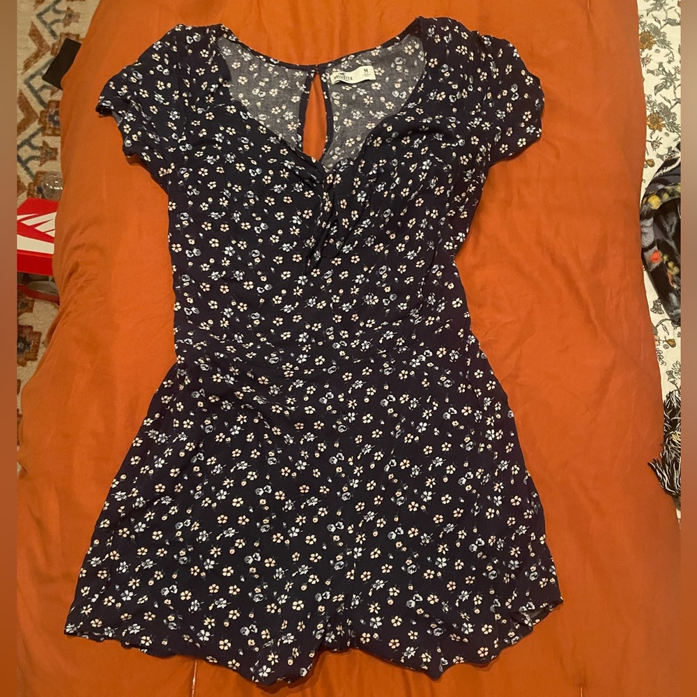 Hollister navy floral romper with pockets